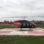 Bell 206L-4 LongRanger helicopter on helipad
